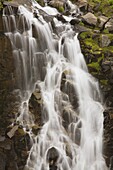 Waterfall Flowing Over Rocks; Washington,Usa