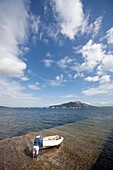 Man Putting Boat In The Water