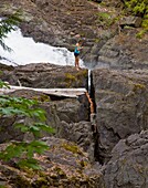 Person By Waterfall, Elk Falls Provincial Park, British Columbia, Canada