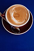 Cappuccino On A Blue Table