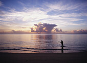 Fisherman At Dusk On The West Coast