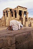 Muslim Man Praying Towards Mecca.