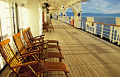 Promenade Deck With Empty Wooden Sun Loungers