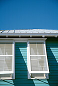 USA, Florida, Pastel Blue Building Exterior With White Shutters; Seaside