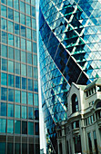 The Gherkin And Neighboring Buildings, London