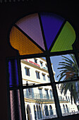 View Through Colorful Arched Stained Glass Window