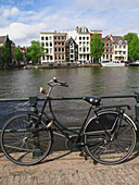 Bicycle Locked To Railing On Waterway