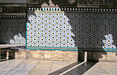 Shadow Of Moorish Archway On Tiled Wall