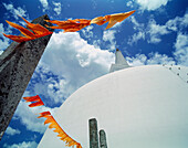 White Stupa Of Ruwanveliseya Dagoba With Orange Prayer Flags