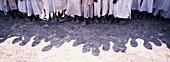 Shadows Of Boys Lined Up