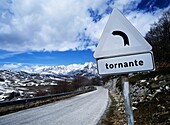 'Tornante' Or Turn Sign In Mountainous Landscape