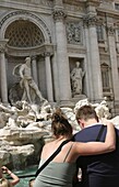Couple Hugging At Trevi Foutain