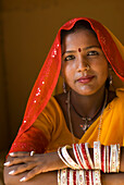 Woman In Yellow Sari With Bangles