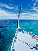 Bow Of Blue Boat On Turquoise Sea