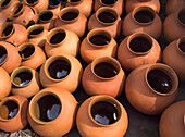 Terracotta Pots With Glazed Interiors.
