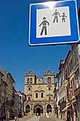 Braga Cathedral And Pedestrian Road Sign