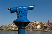 A Blue Tourist Telescope Beside The Quayside At Oporto
