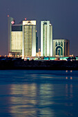 Doha Bay Waterfront Skyline At Dusk.