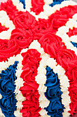 Icing on cake in union jack design as part of village celebration of the queen's diamond jubilee; Great wilbraham cambridgeshire england