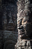 Gesichtsskulpturen an einer Steinmauer in Angkor Wat; Kambodscha