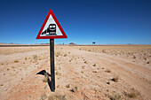 Railway traffic sign beside a desert road; Garub namibia
