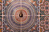 Africa, Morocco. Close-up of tile design patterns around faucet