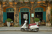 Vespa scooter and The Hill Station Deli and Boutique, Hoi An (UNESCO World Heritage Site), Vietnam