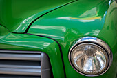 Detail of green classic American GMC truck in Trinidad, Cuba
