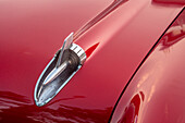Close-up of hood detail of red 57 Chevrolet Bel Air in Habana, Havana, Cuba