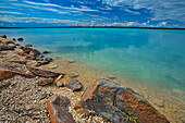 Canada, Manitoba, Little Limestone Lake. Lake and rocks on shore
