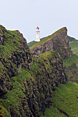 The Lighthouse On Mykinesholmur. Island Mykines, Part Of The Faroe Islands In The North Atlantic. Denmark