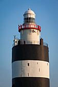 Irland, Grafschaft Wexford, Hook Peninsula, Hook Head, Hook Head Leuchtturm, Sonnenuntergang
