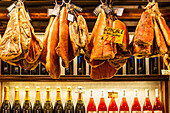 Italy, Rome. Piazza della Rotunda, meat (hams) and wine for sale at Salami Antica