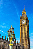 Big Ben Tower Houses of Parliament Lamp Post Westminster Bridge Westminster, London, England. Named after the Bell in the Tower. Has kept exact time since 1859.