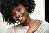 Portrait of smiling young woman in park