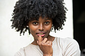 Portrait of smiling young woman in park