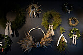 General view of floral wreaths and dried flower bouquets