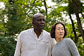 Portrait of middle -aged diverse couple enjoying a day outdoors