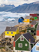 Town of Uummannaq, northwest Greenland, located on an island in the Uummannaq Fjord System, Nuussuaq Peninsula in the background.