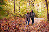 Couple walking in autumn forest