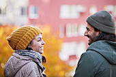 Happy couple in autumn scenery