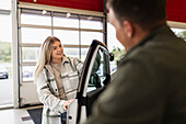 Woman in car dealership office