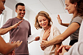 Teachers and children in first aid class