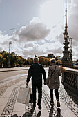 Senior couple walking in city