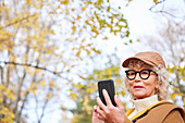 Senior woman using cell phone