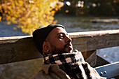 Man relaxing on bench