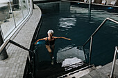 Senior woman in spa swimming-pool
