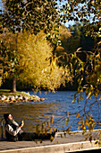 Man relaxing on jetty