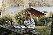 Young woman taking via cell phone