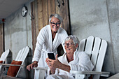 Senior women taking selfie in spa